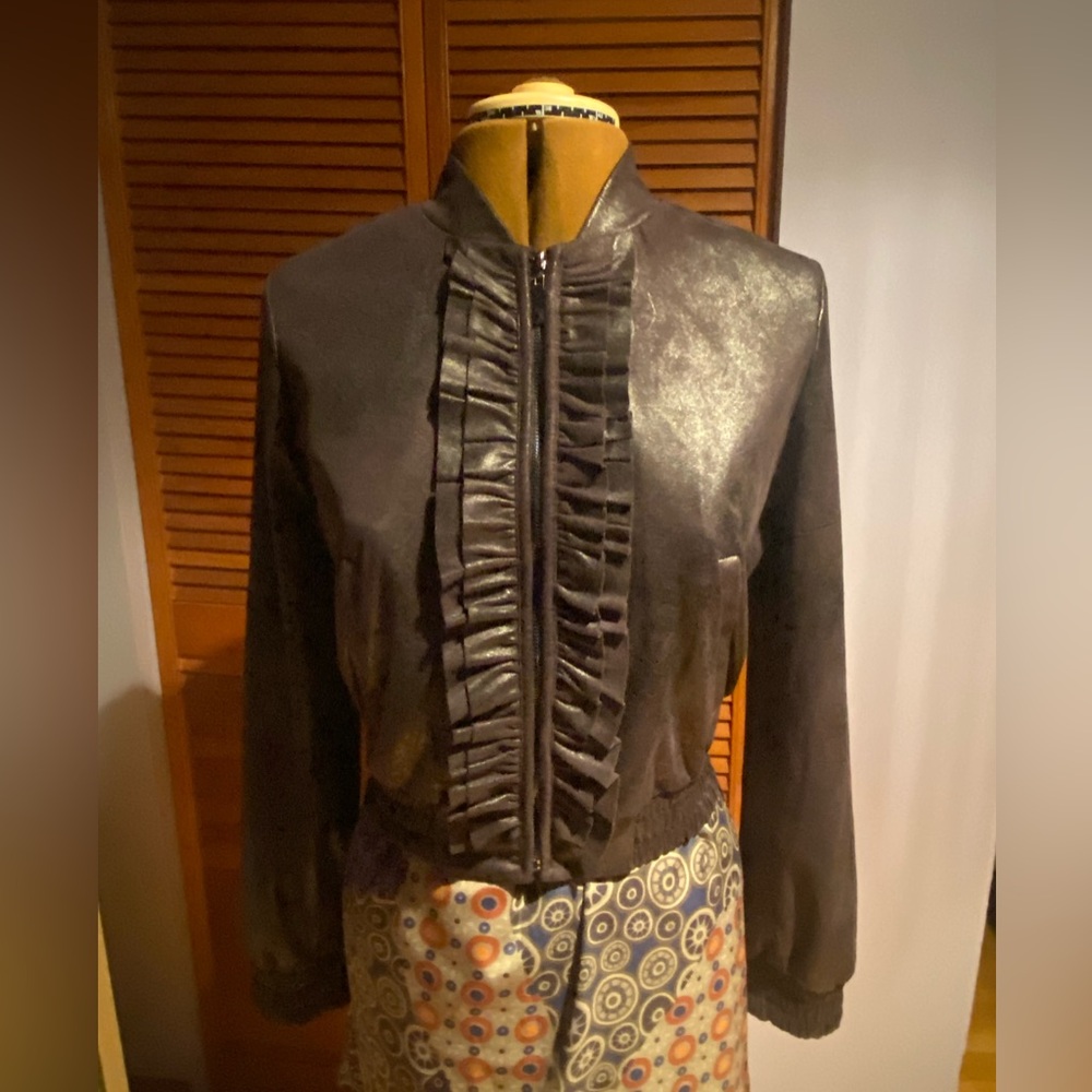 La Fée Maraboutée faux leather jacket with elastic ribbed wrists and waist.